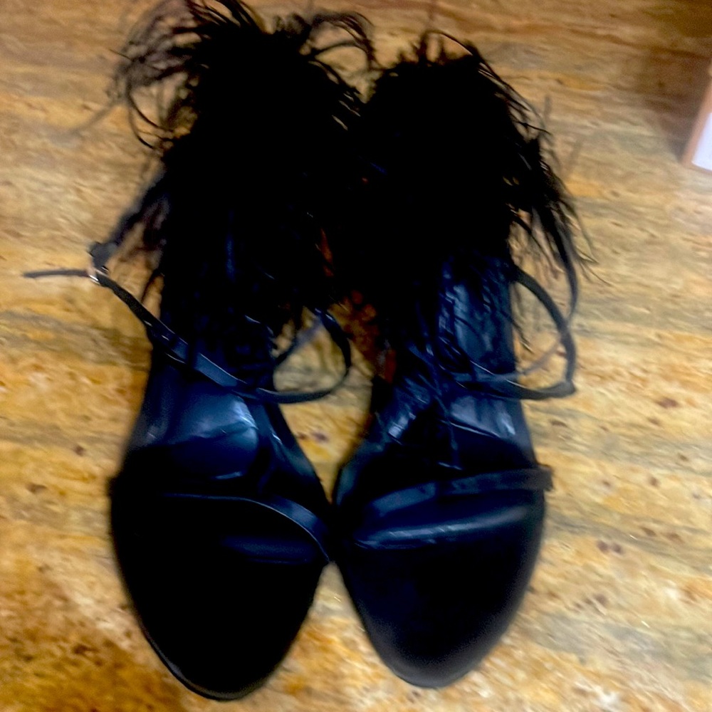 Black open-toe feather shoe.Brand new never worn.